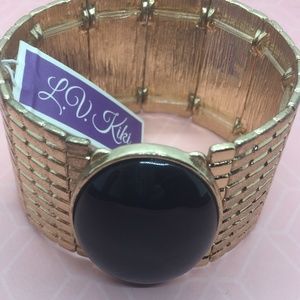 Gold tone Stretchy Bracelet with Black Faux Stone